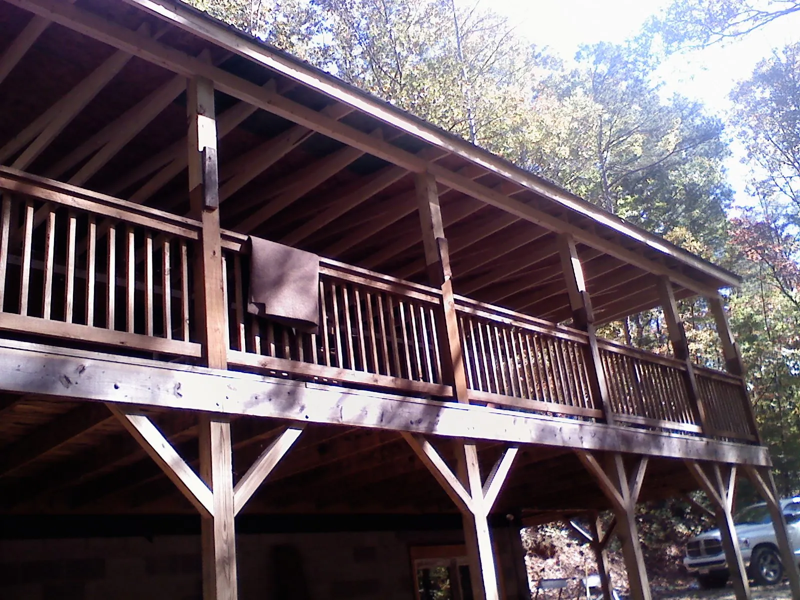 Timber framing under a new elevated porch and deck — Roof Leak Repair in Casey by Roofing Brothers